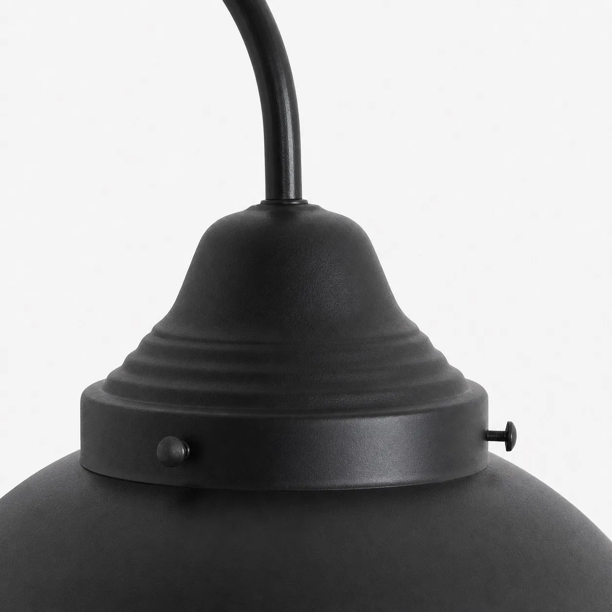 Matte black upper housing and curved arm detail