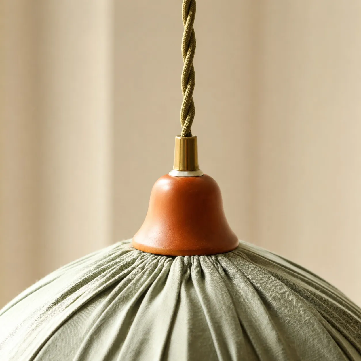 Close view of pendant cord and ceiling detail