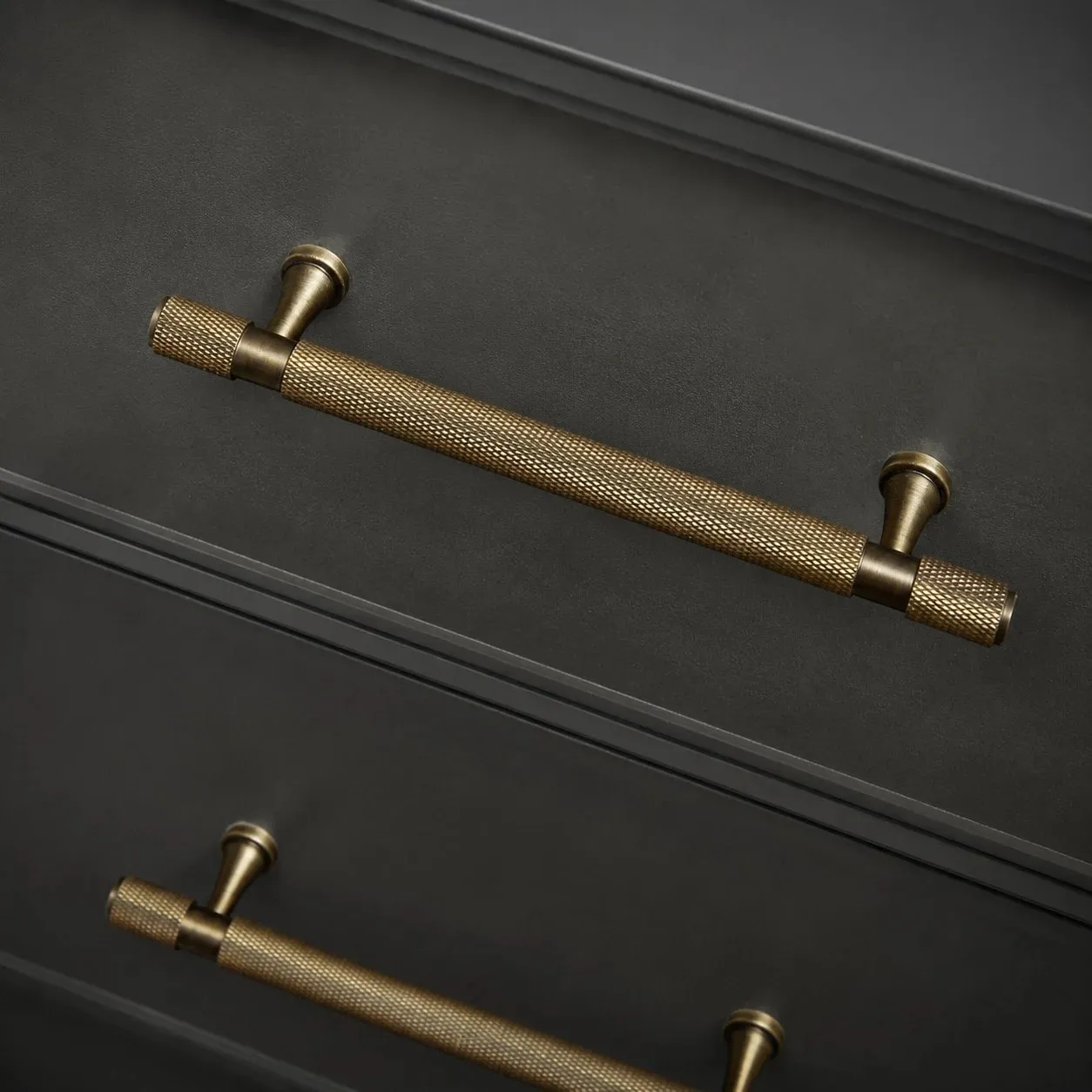 Knurled brass furniture handle closeup